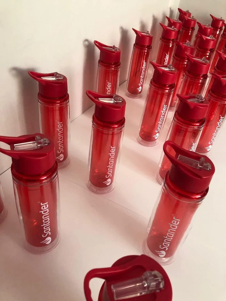 Santander promotional bottles prepared for an event